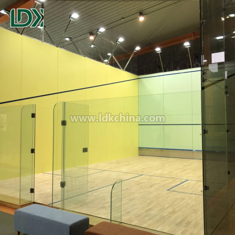 Professional Squash Court Construction with Standard Safety Tempered Glass Walls and Shock Absorbent Wood Flooring Featured Image